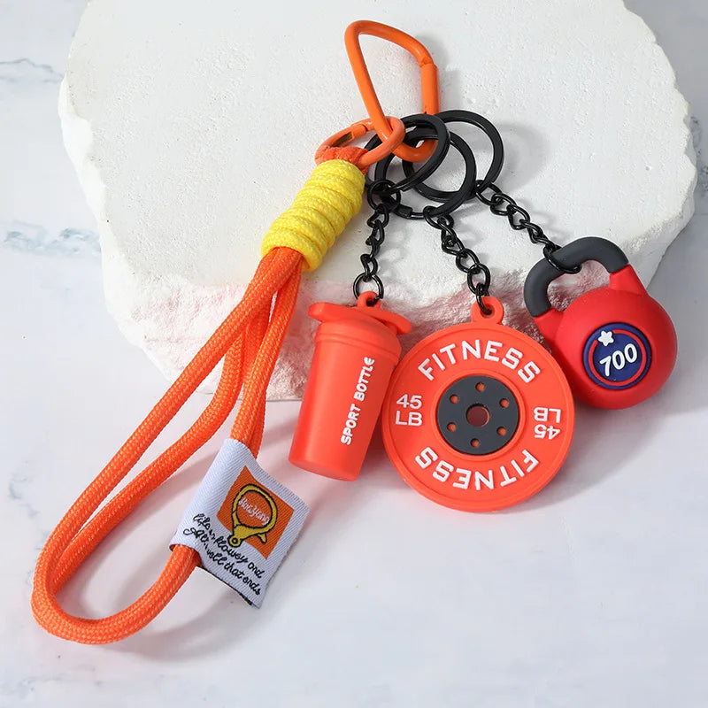 4-in-1 Fitness Keychain Set – Silicone Weight Plate, Kettlebell & Sport Bottle Charms for Gym Bags