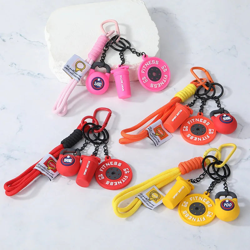4-in-1 Fitness Keychain Set – Silicone Weight Plate, Kettlebell & Sport Bottle Charms for Gym Bags